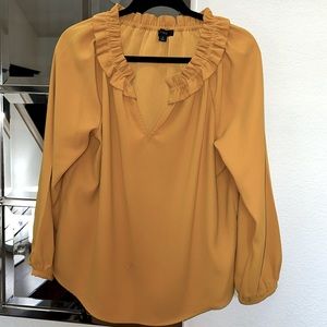 Pre-worn mustard blouse